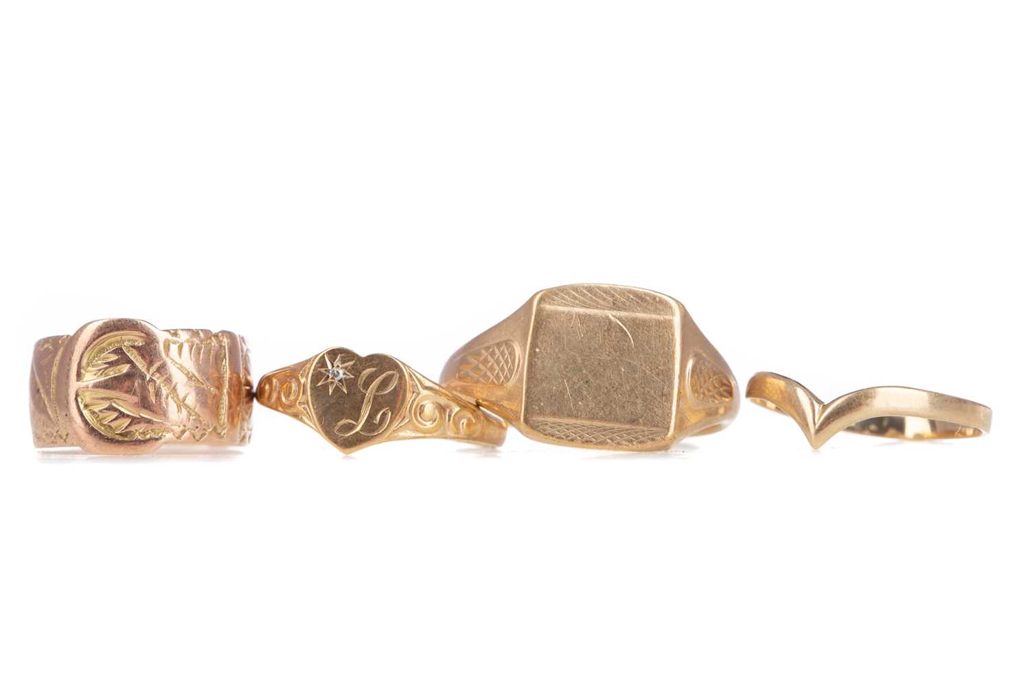 Lot 1142 - FOUR GOLD RINGS