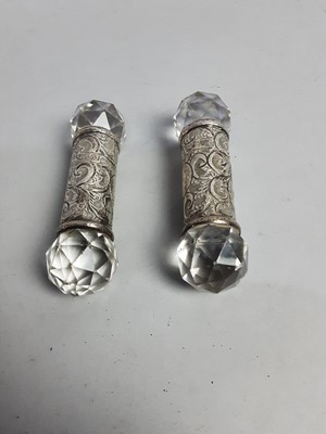 Lot 337 - A PAIR OF SILVER MOUNTED CLEAR GLASS KNIFE RESTS