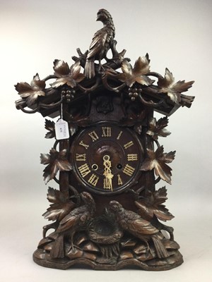 Lot 631 - AN EARLY 20TH CENTURY BLACK FOREST CUCKOO CLOCK