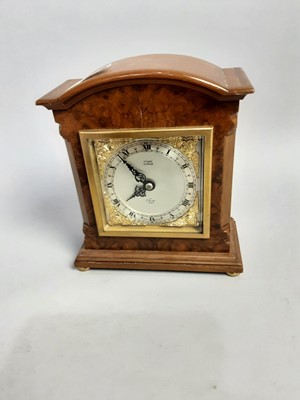 Lot 394 - AN ELLIOTT WALNUT MANTEL CLOCK