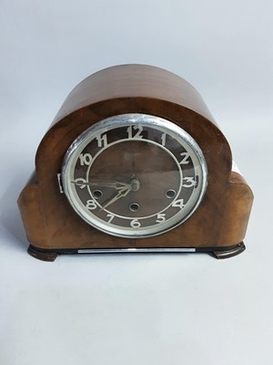 Lot 395 - AN ART DECO WALNUT MANTEL CLOCK