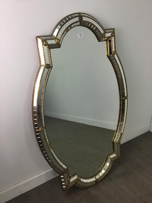 Lot 348 - A MODERN OVAL SHAPED WALL MIRROR