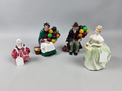 Lot 425 - A ROYAL DOULTON FIGURE OF 'THE BALLOON SELLER' AND THREE OTHER DOULTON FIGURES