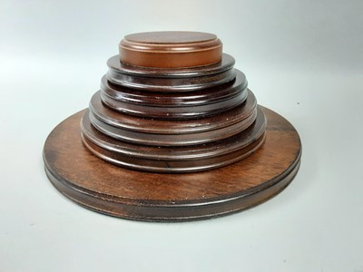 Lot 422 - A GROUP OF WOODEN STANDS