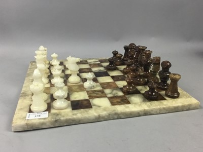 Lot 378 - A COMPOSITE CHESS BOARD WITH PIECES AND A MATCHBOX MODEL VEHICLE