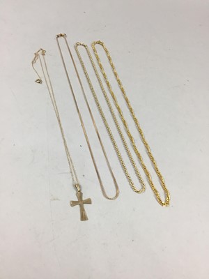 Lot 438 - A NINE CARAT GOLD CROSS PENDANT ON CHAIN AND THREE GOLD CHAINS