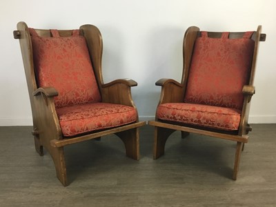 Lot 524 - A PAIR OF OAK WINGBACK ARMCHAIRS