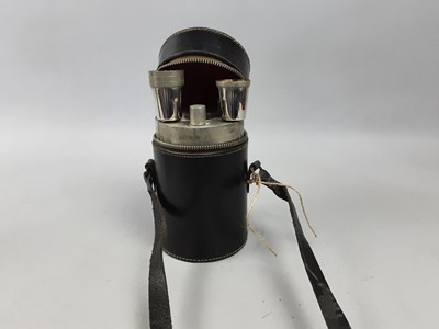 Lot 527 - A PLATED FLASK WITH FOUR CUPS IN CASE