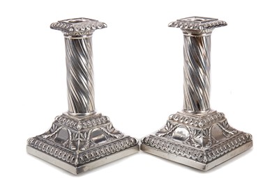 Lot 32 - A PAIR OF VICTORIAN SILVER TABLE CANDLESTICKS