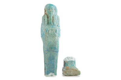 Lot 194 - AN EGYPTIAN BLUE FAIENCE USHABTI