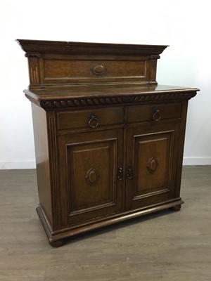 Lot 240 - AN OAK SIDE CABINET