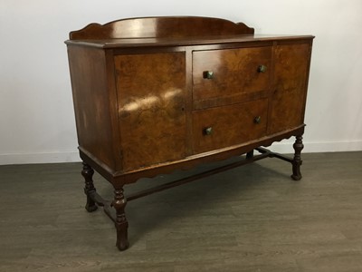 Lot 233 - A WALNUT BOW FRONT SIDEBOARD