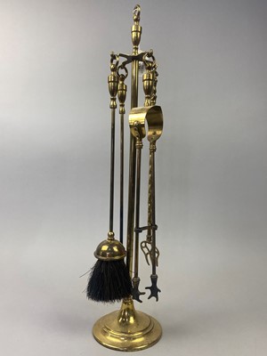 Lot 220 - A BRASS FIRE COMPANION AND OTHER BRASS WARE