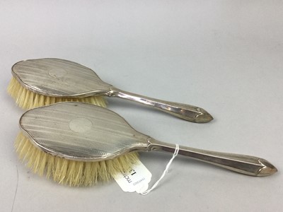 Lot 133 - AN EARLY 20TH CENTURY SILVER FOUR PIECE VANITY SET