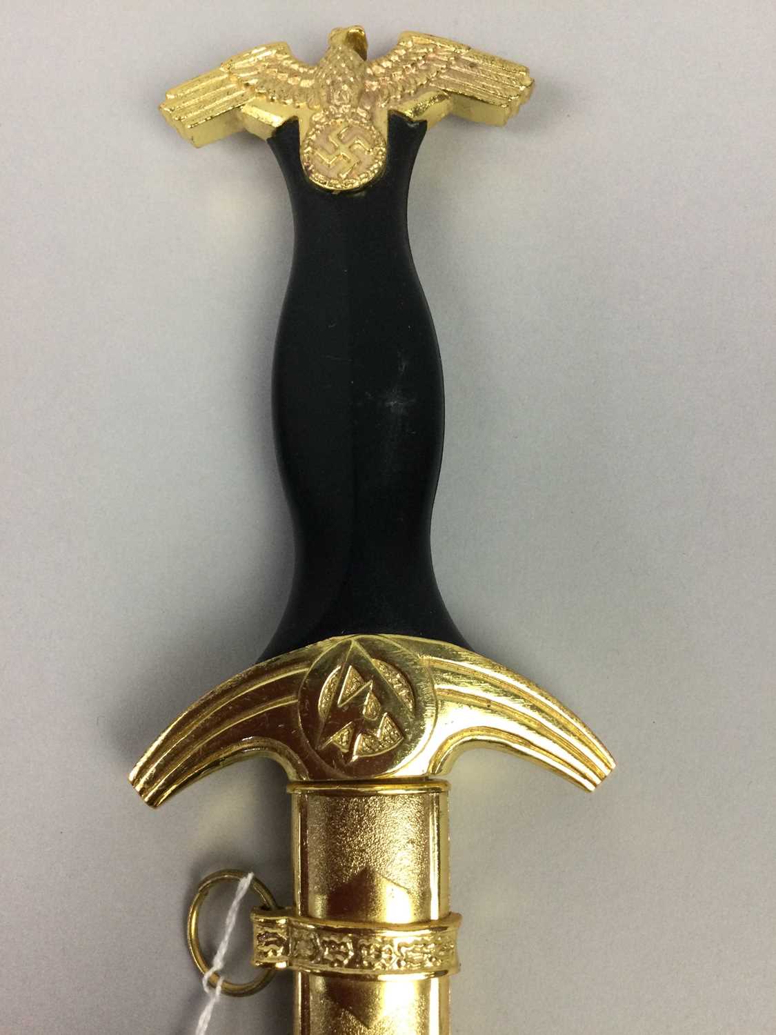 Lot 262 - A REPRODUCTION S.S. SWORD ALONG WITH TWO REPRODUCTION DAGGERS