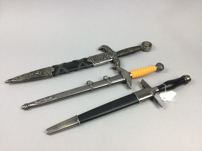 Lot 264 - A LOT OF FOUR VARIOUS GERMAN WWII REPRODUCTION DAGGERS ALONG WITH ANOTHER