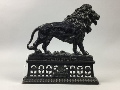 Lot 284 - A PAIR OF CAST IRON 'THE BRITISH LION' FIGURES AND AN OVAL TRAY