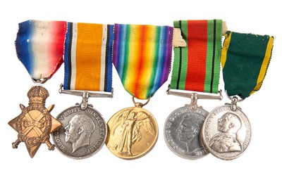 Lot 24 - A SERVICE MEDAL GROUP AWARDED TO E. MITCHELL