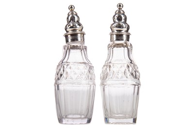 Lot 388 - A PAIR OF GEORGE III SILVER AND CUT GLASS CRUET BOTTLES