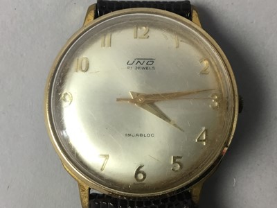 Lot 517 - A GENT'S UNO WRIST WATCH, ANOTHER WATCH AND AN ENAMEL BADGE