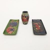 Lot 1154 - SMALL MOORCROFT VASE AND TWO MOORCROFT TRAYS...