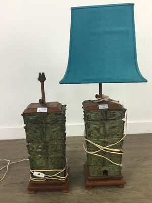 Lot 242 - A PAIR OF CHINESE DECORATED CAST IRON AND WOOD TABLE LAMPS