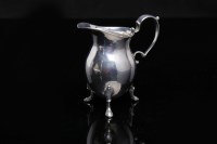 Lot 515 - GEORGE III SILVER BALUSTER CREAM JUG with...
