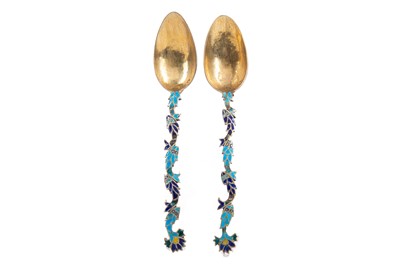 Lot 94 - A PAIR OF SCANDINAVIAN SILVER GILT AND CHAMPLEVE ENAMEL TEASPOONS