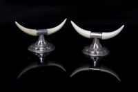 Lot 525 - PAIR OF EDWARDIAN SILVER AND IVORY KNIFE RESTS...