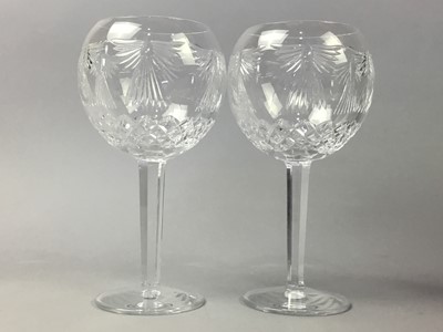 Lot 58 - A SET OF TEN WATERFORD CRYSTAL TOASTING GOBLETS/WINE GLASSES