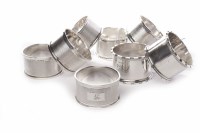 Lot 531 - SET OF SIX SILVER NAPKIN RINGS with engine...