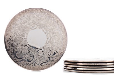 Lot 129 - A SET OF SIX SILVER PLACEMATS