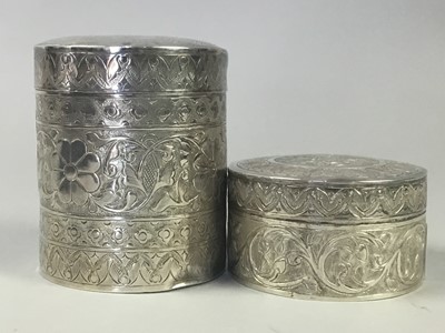 Lot 71 - TWO MALAYA WHITE METAL LIDDED JARS