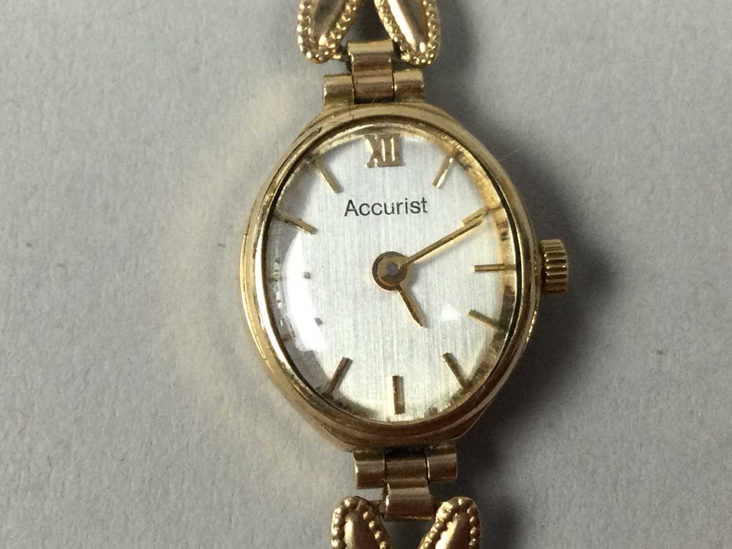 Roseberys London | Accurist. A lady's 9ct gold manual wind bracelet  watch,