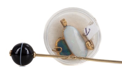 Lot 486 - AN AGATE STICK PIN AND A COLLECTION OF PENDANTS