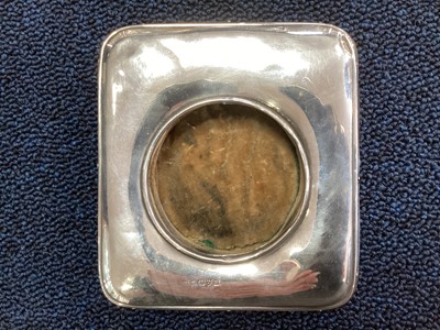 Lot 120 - A SILVER MOUNTED POCKET WATCH HOLDER AND METAL MOUNTED SPORRAN CANTLE