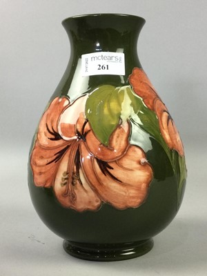 Lot 261 - A MOORCROFT HIBISCUS PATTERN BALUSTER VASE