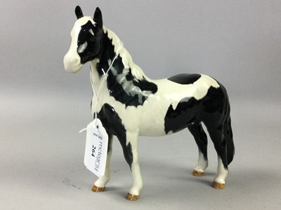 Lot 264 - A BESWICK PIEBALD PINTO PONY