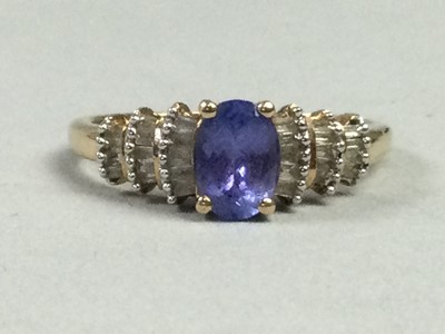 Lot 185 - A TANZANITE AND DIAMOND RING