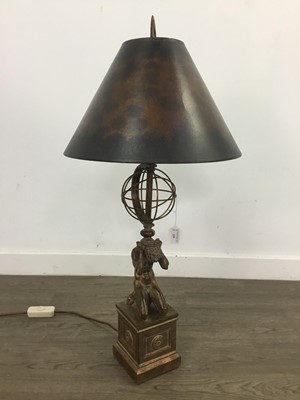 Lot 259 - A BRONZED COMPOSITION FIGURAL TABLE LAMP