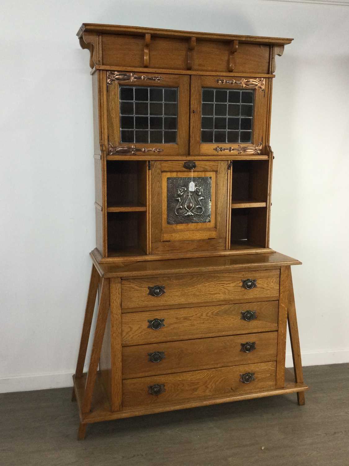 Lot 329 - A GLASGOW SCHOOL ARTS & CRAFTS CABINET ON CHEST