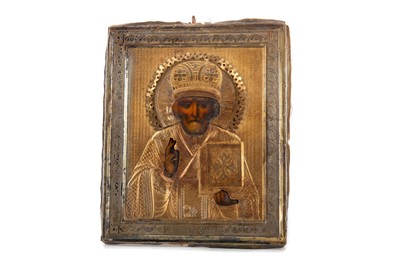 Lot 122 - AN EARLY 20TH CENTURY RUSSIAN SILVER AND PARCEL GILT MOUNTED ICON OF ST. NICHOLAS