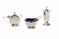 Lot 561 - THREE PIECE CIRCULAR SILVER CRUET SET with...