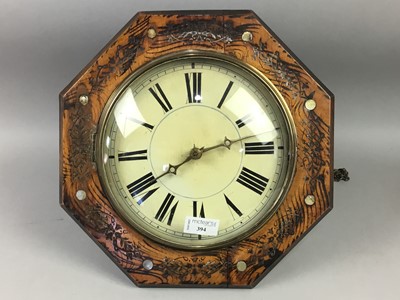 Lot 394 - AN OCTAGONAL WAG AT THE WALL CLOCK