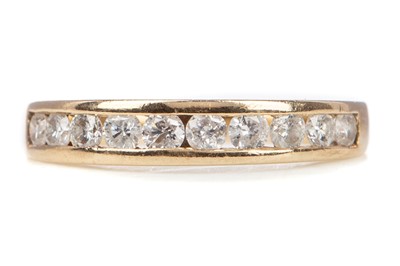 Lot 783 - A DIAMOND HALF ETERNITY RING