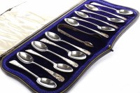 Lot 585 - SET OF TWELVE EDWARDIAN SILVER SPOONS WITH...
