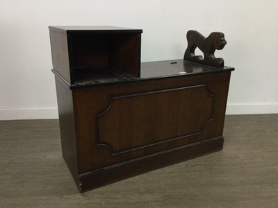 Lot 513 - AN OAK TELEPHONE TABLE