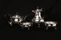 Lot 596 - GEORGE V SILVER FOUR PIECE TEA SERVICE...
