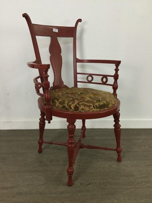 Lot 543 - A RED PAINTED ELBOW CHAIR