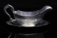 Lot 604 - CONTINENTAL SILVER SAUCE BOAT AND STAND with...